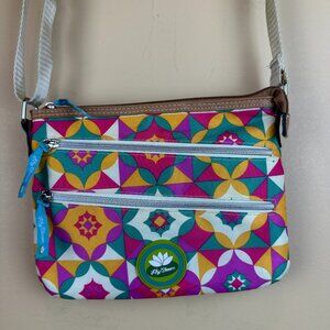 Lily Bloom crossbody purse. Nylon. 2 front zipper pockets. Zipper closure.